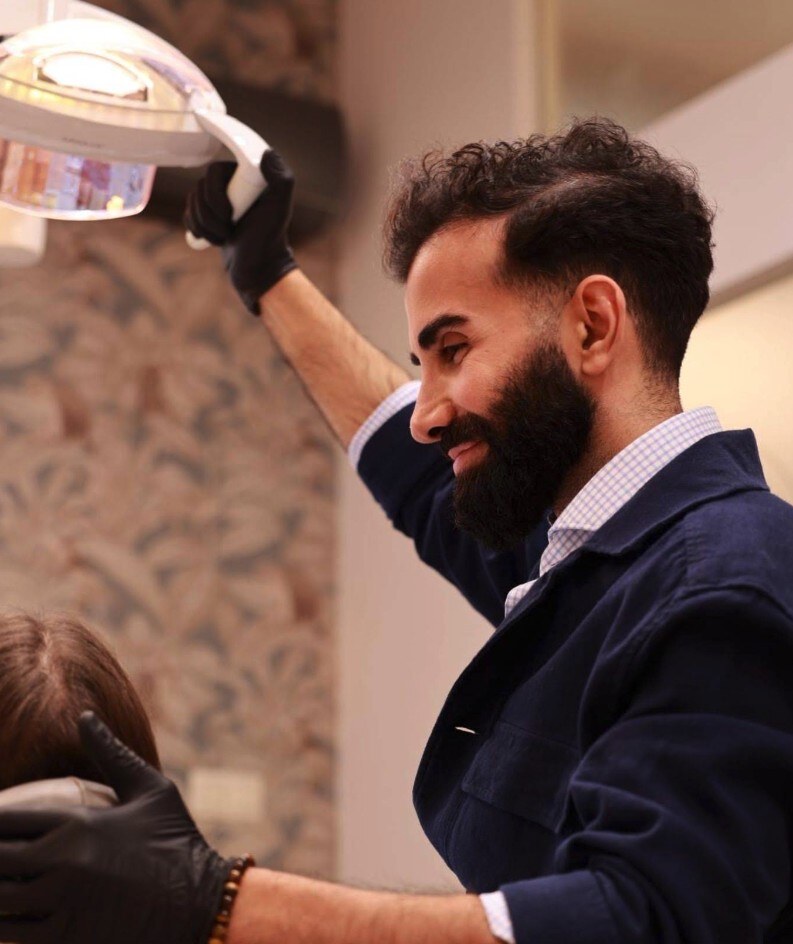 Dr. Nima Aziznia treating a patient